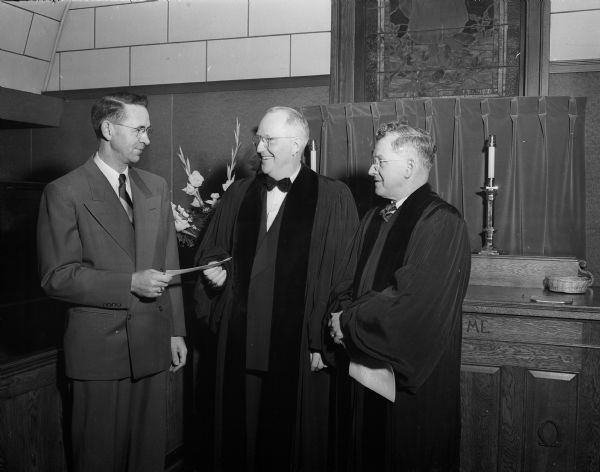 Portrait of three officials who participated in the dedication of the church school annex of Bashford Methodist Church at 11 North 7th Street. They are, from left: Charles Gilpin, chairman of the trustees; Reverend William Waltmire, pastor of Bashford; and Reverend W. Ross Conner, District Superintent.