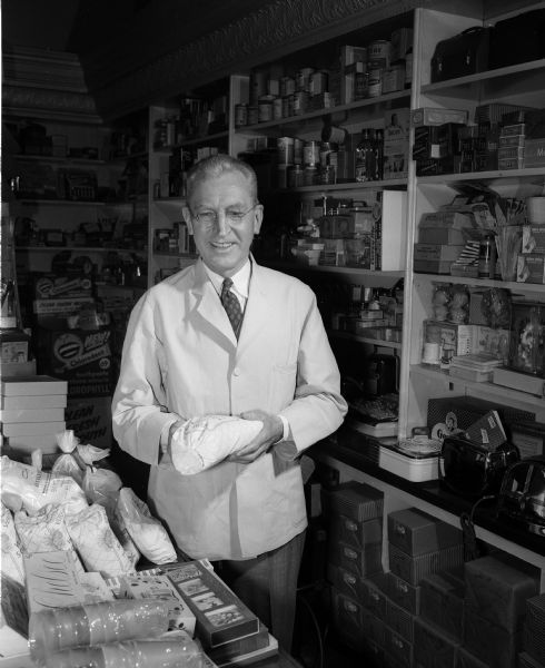 Portrait of Adolph Mallatt, owner of Mallatt's Pharmacy at 3410 Monroe Street. Mallatt is a graduate of Northwestern University.