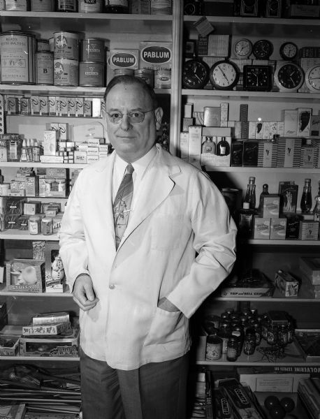 Portrait of William O. Kleinheinz, owner of Kleinheinz Pharmacy at 714 South Park Street.  Kleinheinz is a University of Wisconsin School of Pharmacy graduate.