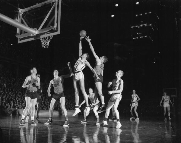 Wisconsin's Paul Morrow (41) scoring a basket against Illinois in their basketball game at the University of Wisconsin-Madison Field House.