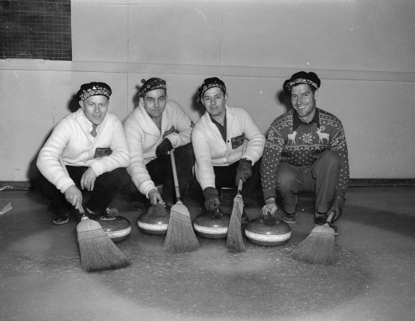 Pictured are the four members of the Onstad rink of the Madison Curling Club who took part in the club's Bonspiel.  Members of the rink, left to right, are: Rags Onstad, skipper; Bud Leonhard, No. 3 man; Jim Cattrell, No. 2 man; and Don Sanford, lead.  The Onstad rink remained undefeated in five Bonspiel matches to capture the Rhodes award.
