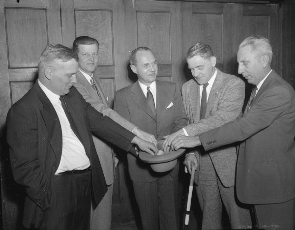 Speakers at a Republican forum held at the Eagles club, 23 West Doty Street, are left to right: John B. Chapple, Ashland, who spoke for Grant Ritter, running as a "favorite son" for General Douglas MacArthur; Harold LeVander, South St. Paul, Minnesota, representing Harold E. Stassen; Governor Kohler, moderator of the forum, District Attorney Harlan W. Kelley, Baraboo, representing Senator Robert A. Taft (Republican-Ohio) and Attorney Fred Risser, Madison, who spoke on behalf of California's governor Earl Warren.