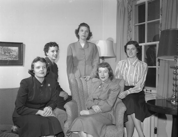 Pictured are five members of the Panhellenic Alumnae Association who are meeting to plan their annual scholarship benefit. From left to right, the women are: Mrs. Charles W.Chapman, Kathleen McGuire, Francis Kleinert, Patrica Proulx, and Joanne Bush.