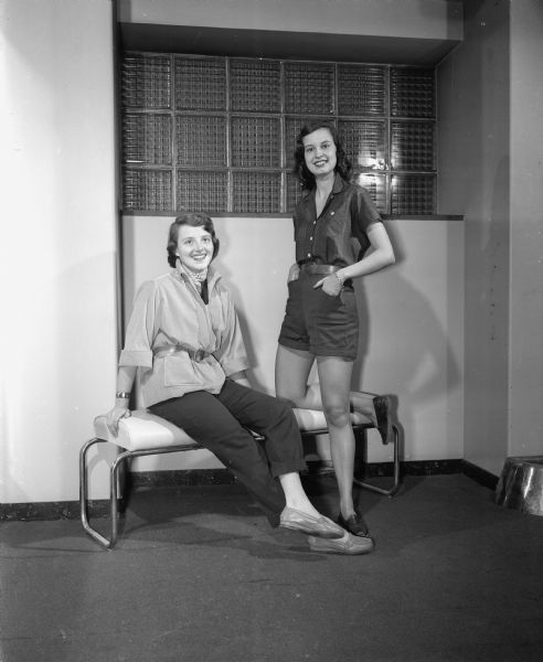Nancy Lee Bassett, on the left,a member of Kappa Kappa Gamma, from Cleveland Ohio and Jenese Mondachine, right, a Delta Gamma member from Eau Claire, Wisconsin were two of the models for the annual spring style show of the University of Wisconsin Women's Self-Government Association.