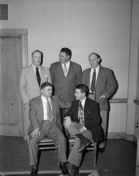 Group portrait of newly elected officers of the National Intercollegiate Boxing Coaches Association and Cliff Johnson, Athletic Director at McNeese State College in Lake Charles, LA. Front row, l to r: Ed Sulkowski, Penn State, first vice-president; Kit Kitzsimmons, South Carolina, secretary-treasurer; Back row, l to r: Vern Woodward, Wisconsin, president; Cliff Johnson; and Milton Heit, Idaho State, second vice-president.