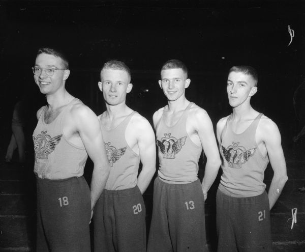 This quartet won the sprint medley for Madison West in the West Relays. They are shown, left to right, in the order they ran as follows: Billy Mansfield, 440; Rogert Gaumnitz and Tom Mack, 220 each, and Bob Brennan, 880.