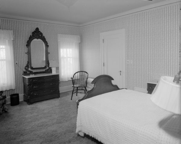 A second floor bedroom at the UW Chancellor's house, 130 N. Prospect Avenue, has windows that look out toward Lake Mendota. The house, built in 1912 for John & Helen Olin and given to the university in 1925 for the official residence of university presidents, is being repaired and redecorated.