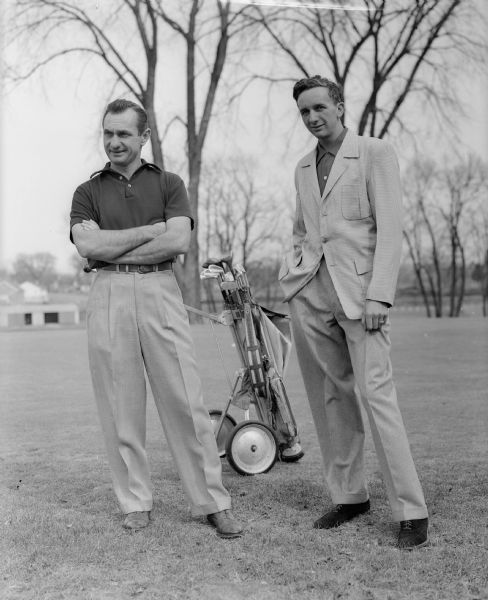 On the left, Tony Mierzwa, club professional, is standing next to his new assistant this year, Ralph Parker of Johnstown, Pennsylvania at the Maple Bluff Country Club.