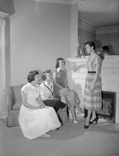 Shown as they rehearsed for a benefit style show at the University of Wisconsin-Madison Alpha Phi house are four of the models. From left to right, are: Barbara Malone, Barbara Zents, Mary Kay Cafferty, and Marilyn Allen.