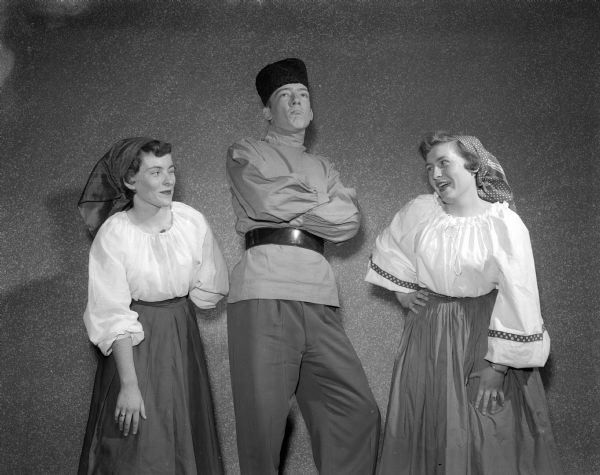 Two girls and one boy in costumes for an Edgewood play (operetta "Forest Prince"?).