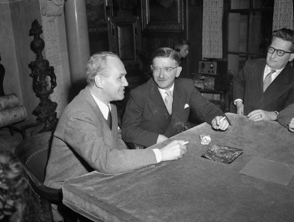 Governor Walter Kohler, (left) chats with Chancellor Leopold Figl, Austrian Chancellor, during the latter's visit to Madison. Dr. Figl, on a 16-day visit to the United States, is the first Austrian chief of state to visit this country.