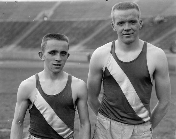 Two Whitefish Bay trackmen helped lead their school to its 16th straight WIAA Class B championship.  Bill Eichfeld, left, scored victories in both 100- and 200-yard dash events.  Gary Winske, right, set a new record in the 440.