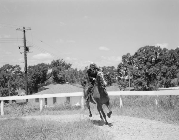 Betty Lou Thronson rides a horse named Randi-Ru.