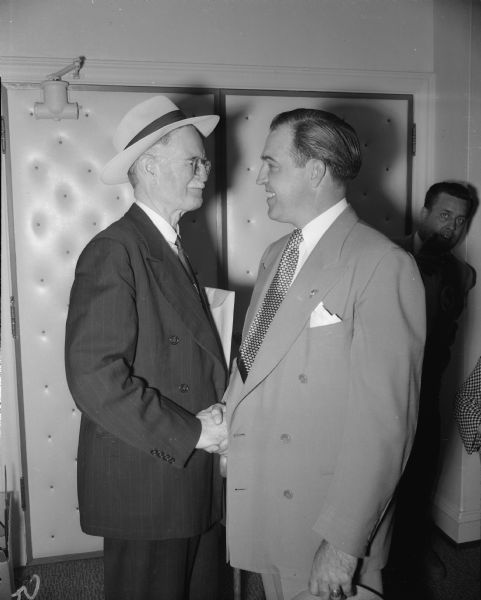 Wisconsin Secretary of State Fred R. Zimmerman (left) chats with Charles P. Curran of Mauston at the Republican National Convention in Chicago.
