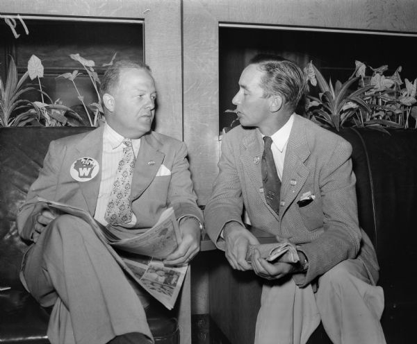 Ellis H. Dana of Madison (left), executive vice-president of the Wisconsin Council of Churches, Inc., visits with Wilber Renk of Sun Prairie at the Republican National Convention in Chicago. Both men are supporters of Dwight Eisenhower for president.