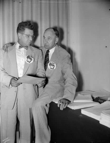 Jack Rouse of Baraboo (left), executive secretary of the Wisconsin Republican party, gets some advice from attorney Lyall T. Beggs of Madison. Beggs was a supporter of Robert A. Taft.