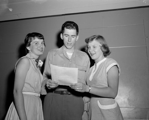 Among the committee members of the Rainbow Girls and DeMolay Clubs making plans for a summer dance to be held in the Crystal Ballroom of the Masonic temple are, left to right: Karen Talke, entertainment chairman; Carl Lindenlaub, general co-chairman; and Jean Stich, decorations chairman.