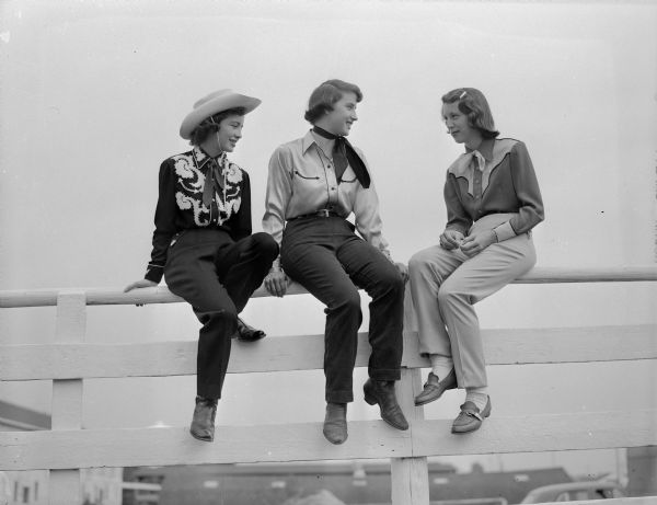 Contenders in the western class of the Madison Saddle Club horse show are, left to right: Nancy Timmons, Janet Marlett, and Colleen Houghton.