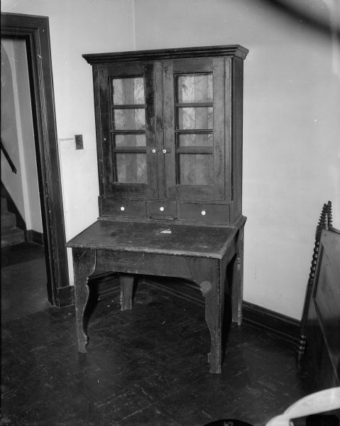 An antique captain's desk from the collection of the late Miss Catherine Corscot. The sale of her items was held in Guild Hall at Grace Episcopal Church, 6 North Carroll Street.
