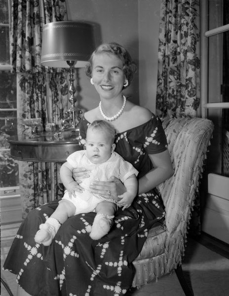 Portrait of Bette Schneiders Sonneland and her 5 month old son Arthur Malcolm III ("Kim") at the home of Bette's parents, 19 Fuller Drive.