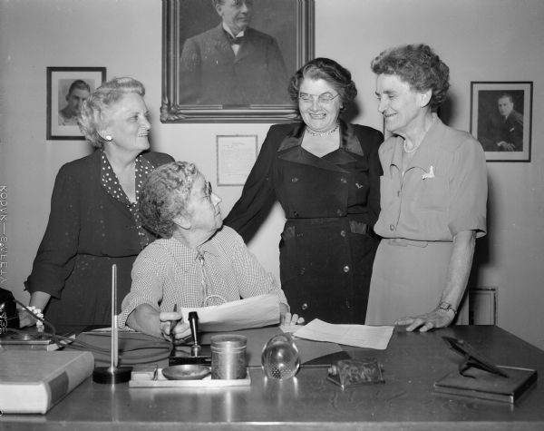 Four of the small and selective group of national honorary members of Zeta Phi Eta speech fraternity are Madison women. Pictured from left to right are: Cornelia C. Weaver, Emeritus Professor Gertrude Johnson, Professor Gladys Borchers, and Professor Harriett Grim.