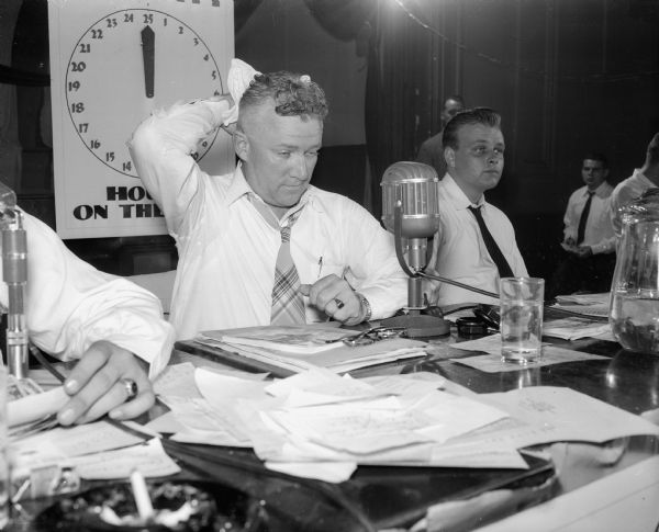 Leonard F. Schmitt, Merrill attorney who is challenging U.S. Senator Joseph B. McCarthy for the Republican nomination in the primary, is pictured as he ended his 25-hour radio talkathon.