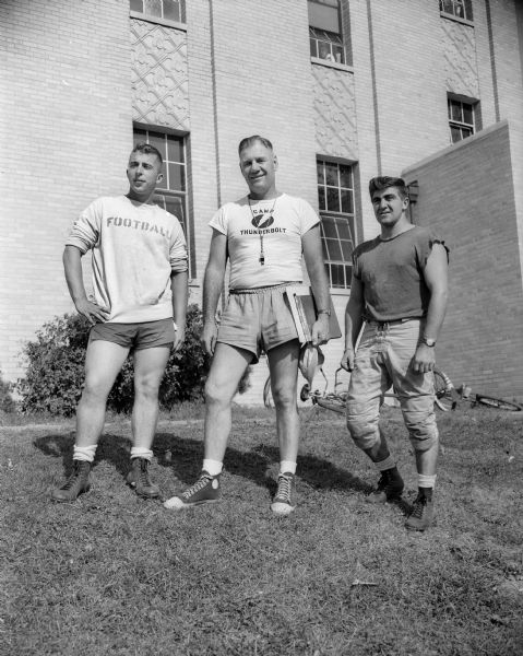 Edgewood High School football coaches, from left to right:  Rollie Spahr, Earl Wilke, and Mike Gentilli.