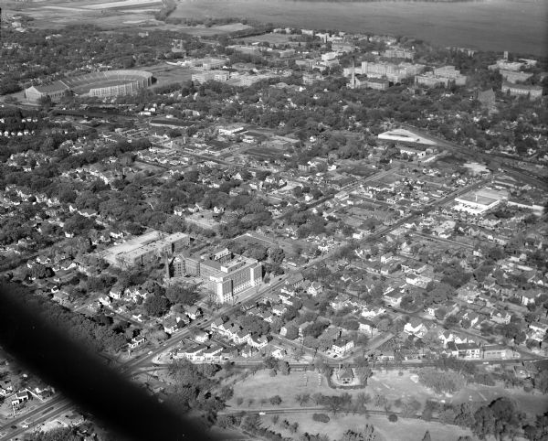 Aerial view of Madison General Hospital and the surrounding Greenbush and Vilas neighborhoods with Camp Randall and Lake Mendota in the background.