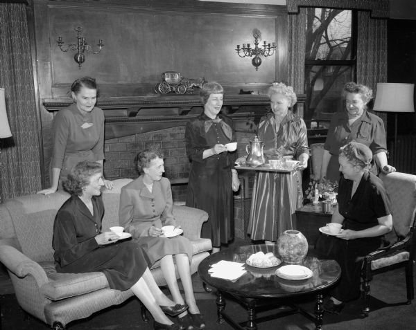 Pictured are the women who will take part in the Madison Woman's Club one-act Christmas play "Good Will Toward Woman". This play is presented by the drama department of the club. Seated in the foreground are Mary Shattuck, Amy Melby, and Mary Hatfield. Standing are Emily Ahearn, Royetta Steinhaus, Irene Peterson and Edith Johnson, the director.
