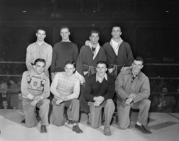 All University of Wisconsin boxing champions are, front row: Robert Hennessy, Portage, 125 lbs.; Charles Magestro, South Milwaukee, 139 lbs; Tommy Zamzow, Madison, 132 lbs; Pat Sreenan, Beloit, 147 lbs.; back row: Bobby Morgan, Duluth Minn, a NCAA title-holder; Bobby Meath, New Richmond, 165 lbs.; Bobby Hinds, Kenosha, heavyweight; Ray Zale, Gary Ind., 178 lbs.