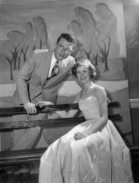 Portrait of Jack Barnard and Martha Hinrichs, king and queen of the Junior Prom of Wisconsin High School.