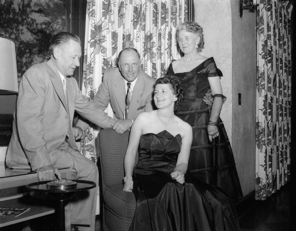 Two couples attend the Cosmos Dance Club 30th anniversary dinner dance at Nakoma Country Club. Left to right: Oscar Loftsgordon; Irving R. Jacobson, president of the club; Olga Loftsgordon; and Minnie Jacobson.