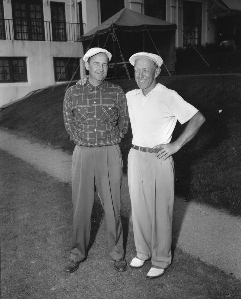Portrait of two former Big 10 golf champions, Sid Richardson (left) of Northwestern and Les Bolstad of Minnesota. The men are now coaches for their schools at the Big 10 golf tournament 1953.