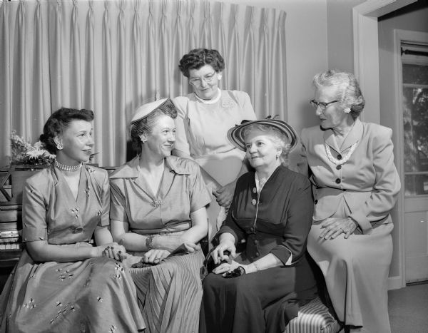 Tea at the home of Carl A. and May Brandly, 4329 Hillcrest Drive, for wives of the men who attended the fifth annual Wisconsin Postgraduate Conference for Veterinarians. Left to right:  Mrs. A.M. McDermid (Middleton); Irene Reading (Madison); Helen Winner (Madison); Mrs. F.W. Milke (Milwaukee); Mrs. E.A. Beach (Verona).
