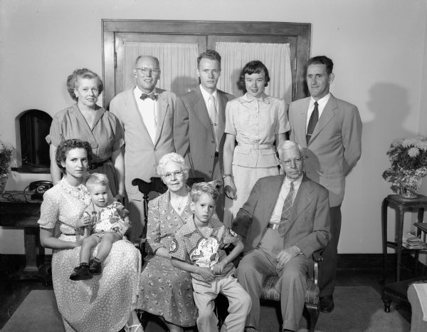 Group portrait of Charles L. and E. Pearl Dean and their family, gathered for the couple's 50th wedding anniversary.