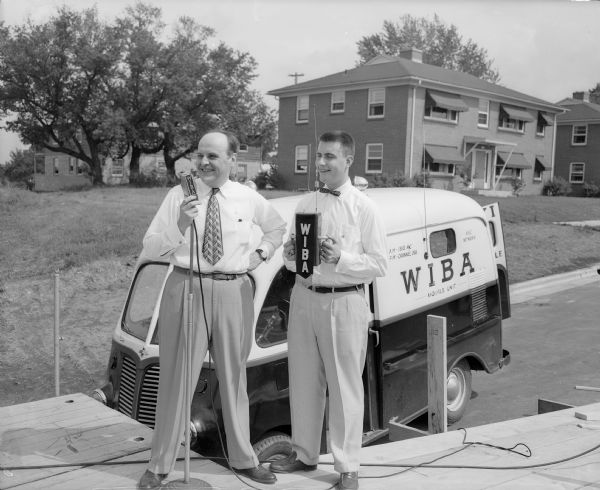 WIBA truck and two radio broadcasters on south Midvale Boulevard, the site of the Madison Soap Box Derby.