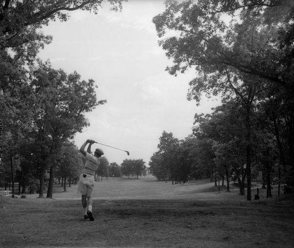 Unidentified golfer at Koshkonong Mounds Country Club in Fort Atkinson, site of the 31st annual East-Central Wisconsin Golf Association tournament.