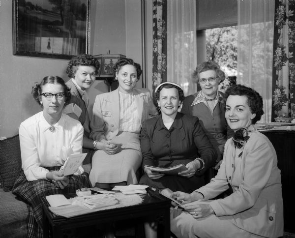 Members of the Wisconsin chapter of the American Business Women's Association's membership committee meet to plan a tea. Left to right: Marcella Finegan, Elsa Fagerstrom, Freida Anderson, Esther Holzworh, Betty Parker and Helene Blied.