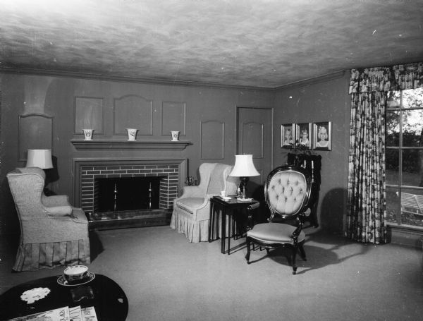The living room of the Laurence and Frances Fitzpatrick home at 1504 Sumar Drive, Shorewood, featuring a fireplace.