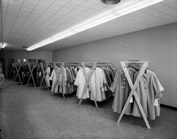 Racks of coats at the May's women's clothing store in the new Madison East Shopping Center on East Washington Avenue. Advertised as the state's first self-service apparel shop.
