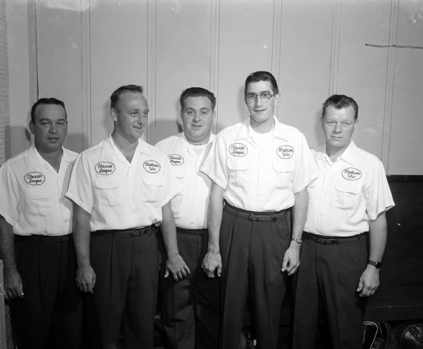 Group portrait of one of three men's bowling teams in the Classic League.