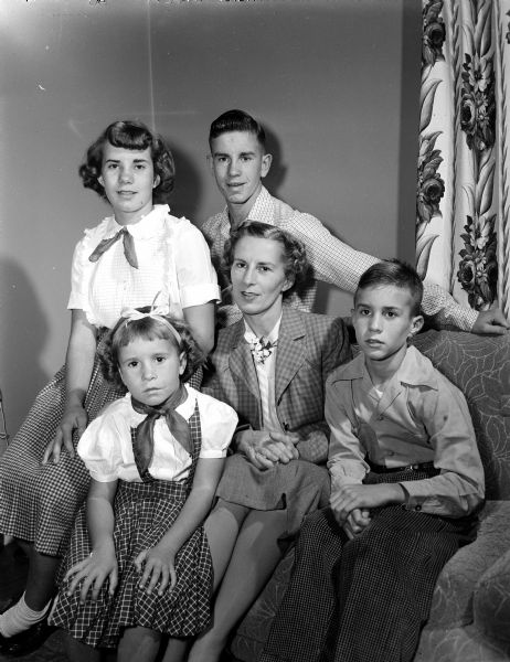 Group portrait of Mrs. John P. Bolger and her four children.