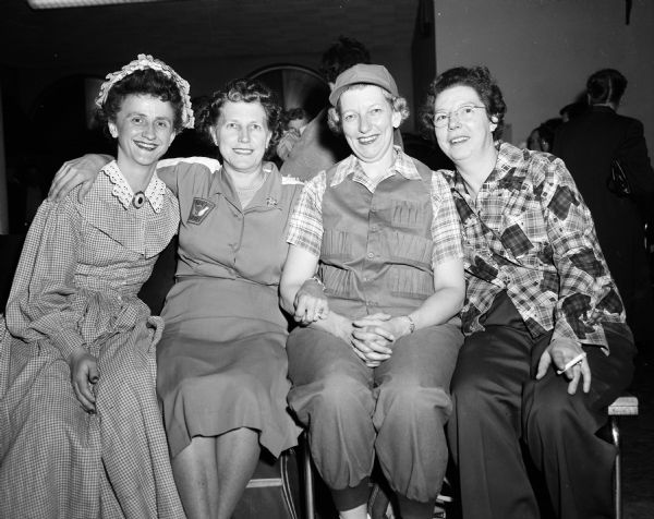 The Business Women's Bowling League staged its first annual dress up bowling sessions at the Plaza Alleys. Pictured are Hildegarde Baer, Ruth Ansfield, Lucille Schoonmaker and Irene Zimbrich who came as bowlers.