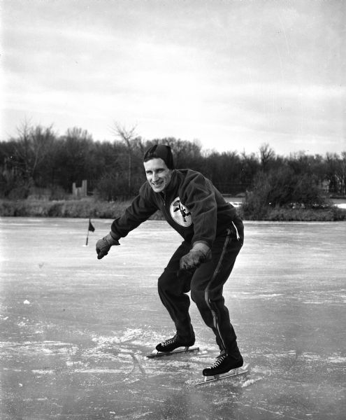 Bill Carow of Madison wins the Senior Men's Speed Skating Championship while representing the West Allis Skating Club.