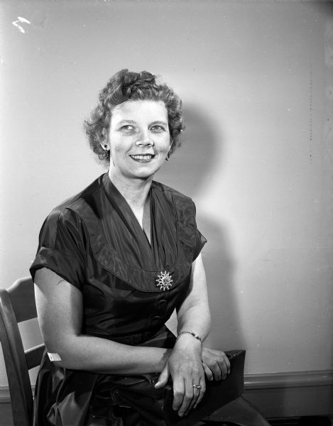 Portrait of Mrs. Morris Voelker, Ellsworth, one of the women in attendance at the Farm and Home Week at the University of Wisconsin.
