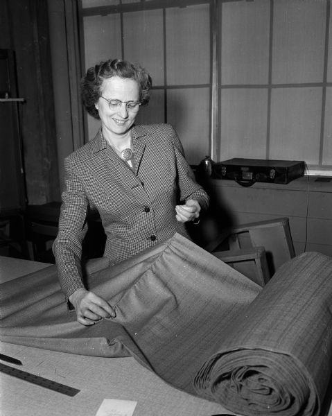 Violette Wartzok demonstrates a procedure in the drapery-making class at the Madison Vocational and Adult School.