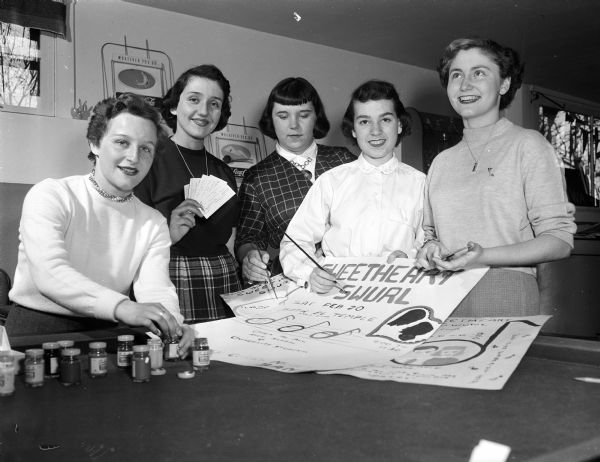 Group portrait of the B'nai B'rith girls as they plan the organization's "Sweetheart Swirl." Left to right are: Gail Chechik, Bunny Epstein, Nancy Wagner, Penny Haines, and Liz Rocklin.