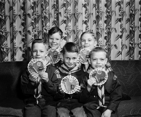 Five Cub Scouts sent 32 Valentines to children who were patients at Morningside Sanitarium. Left to right in the front row are John Riphan, 2015 Corscot Ct.; Wayne Harlan, 1002 Williamson St. and Carl Horstmeyer, 2033 Helena St. and in the back row are Lenard Stone, 929 Williamson St. and Ronald Knudtson, 2105 Winnebago St.