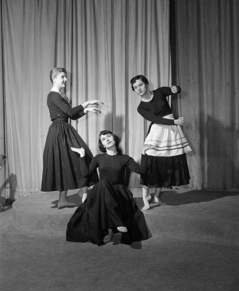 As part of Co-ed's Week, an event designed to combine features of special interest to college women, three U.W. dance majors perform an interpretive dance called "Marriage vs. Career". Left to right: Judith Morris, Ithaca, New York; Pamela Dunham, Cranford, New Jersey and Carolyn Ingle, Evansville, Indiana. The event is sponsored by the U.W. Associated Women Students organization.
