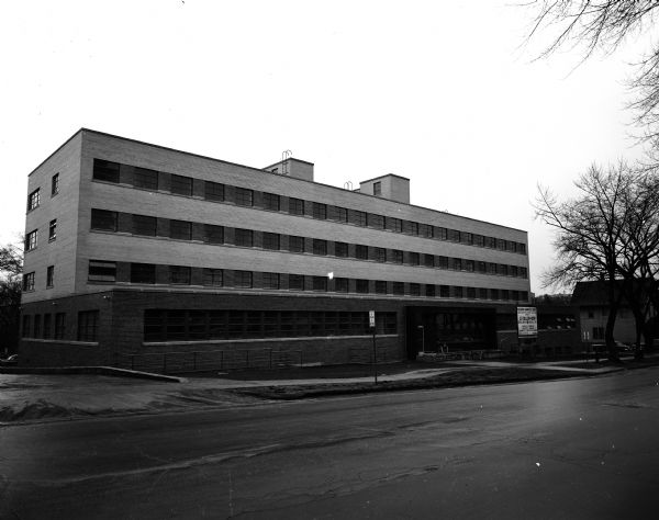 Exterior view of the new Wisconsin Diagnostic Center for the intensive study of mentally and emotionally disturbed young people, referred to it by the state Department of Public Welfare. It is under the supervision of the Mental Hygiene Division of the State Department of Public Welfare and connected with the University of Wisconsin medical school as a training ground for medical students and future psychiatrists.